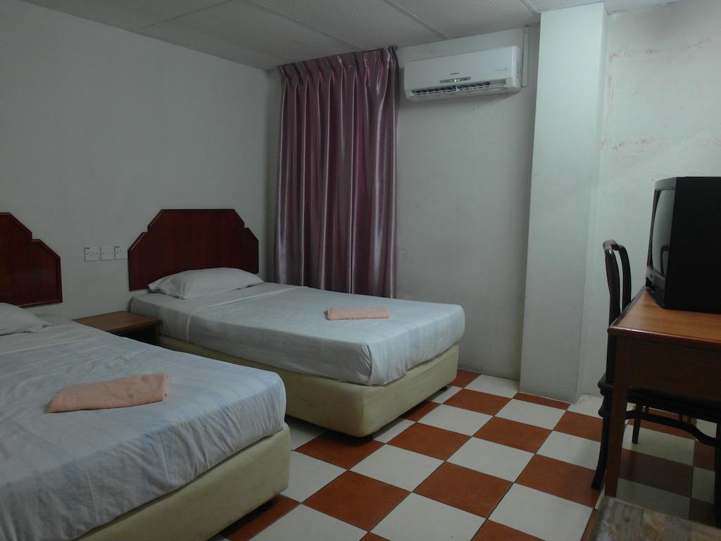 Silverwood Inn Miri Værelse billede