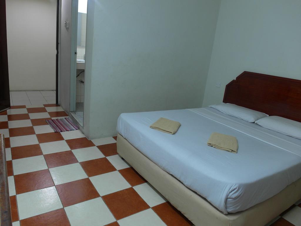 Silverwood Inn Miri Værelse billede